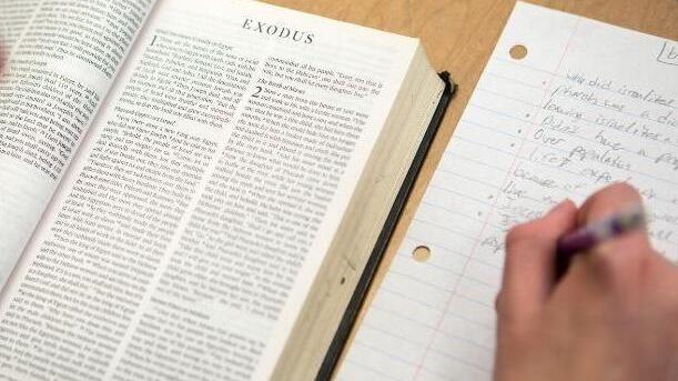 open Bible and notebook